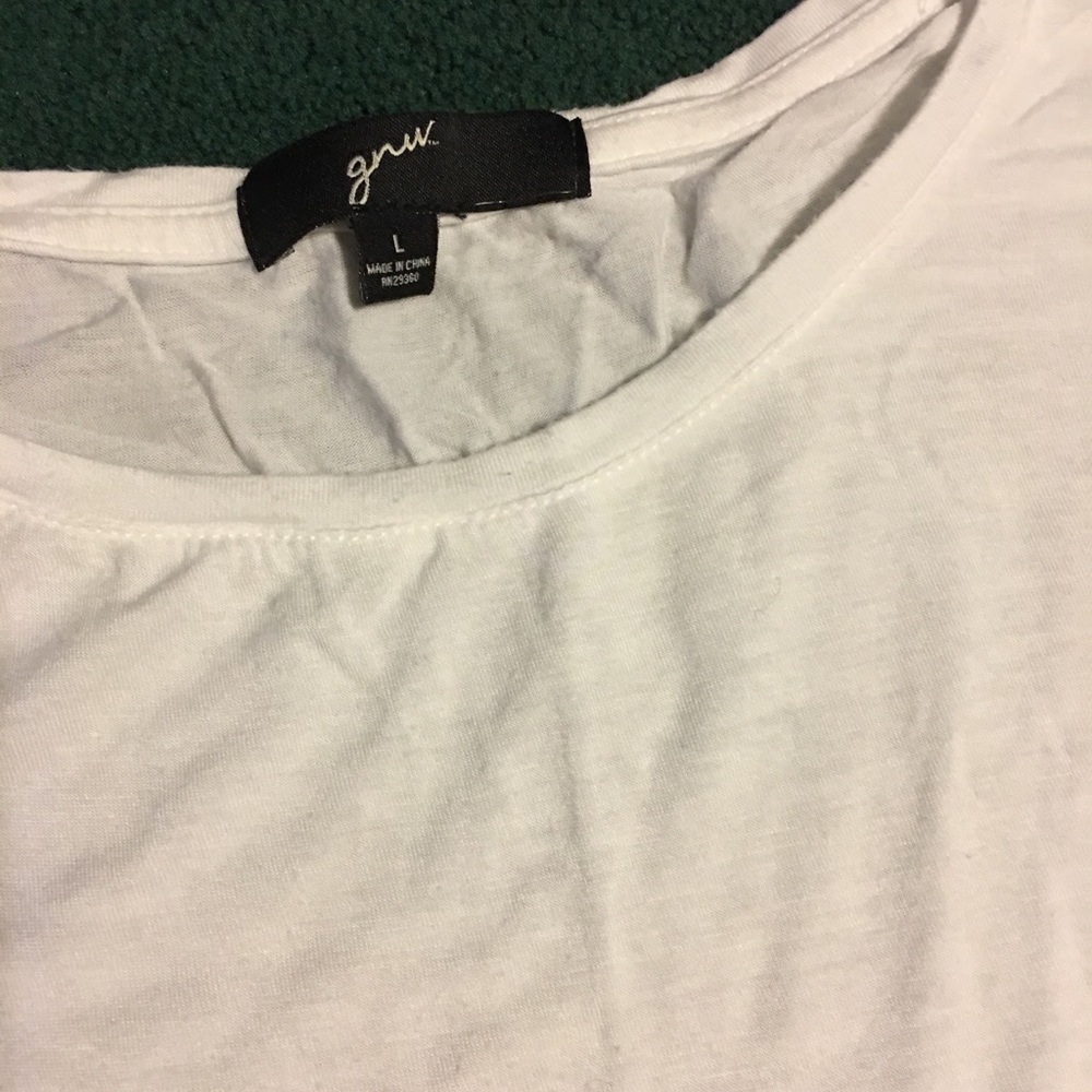 Large, white, super soft, t-shirt.